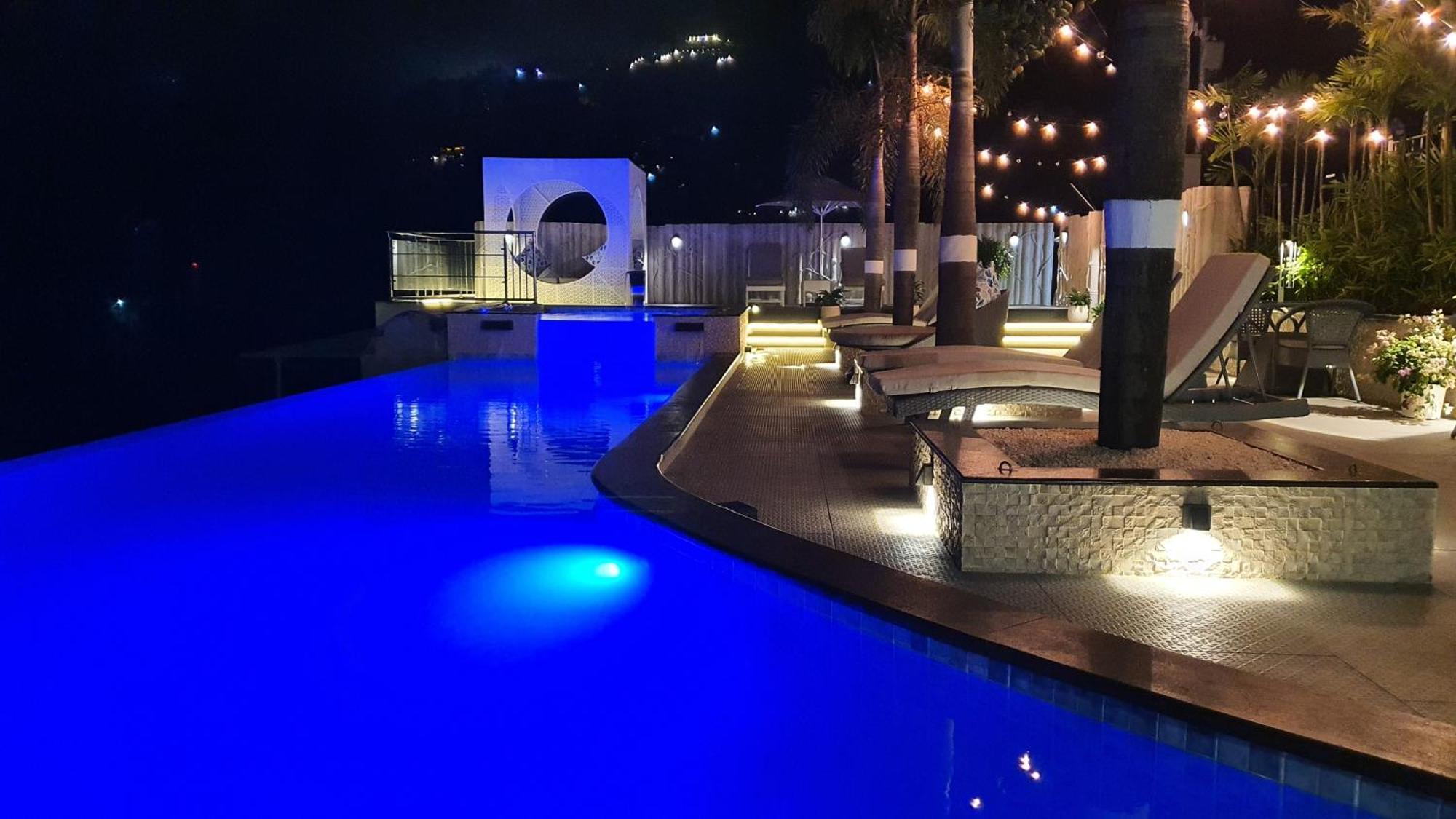 The Panoramic Getaway Otel Munnar Dış mekan fotoğraf The pool at the hotel